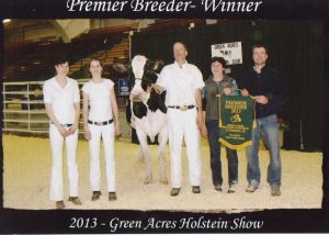 The Van den Pol family receiving Premier Breeder at the 2013 Green Acres Holstein Show