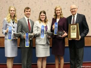 First-place collegiate team from the University of Minnesota in the dairy cattle judging contest at NAILE, Louisville, KY (l. to r.): Haely Leiding, Fountain, MN; Trent Dado, Amery, WI; Krista Styer, Menomonie, WI; Brooke Roberts, Whitelaw, WI; and Dr. Les Hansen, coach.